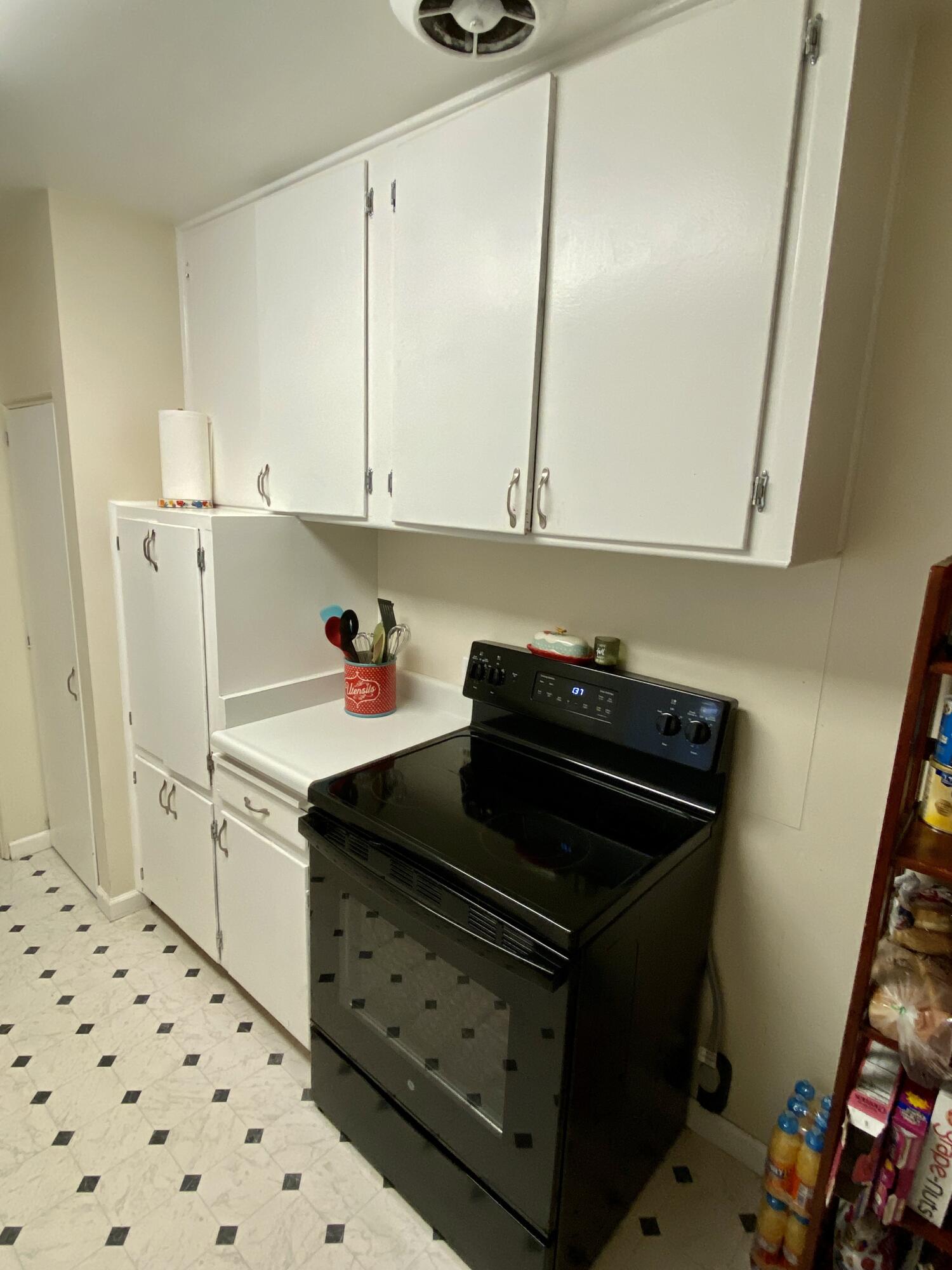 2890 Irwin Road Redding, CA 96002 - Photo 11 of 28 a kitchen with sink and cabinets