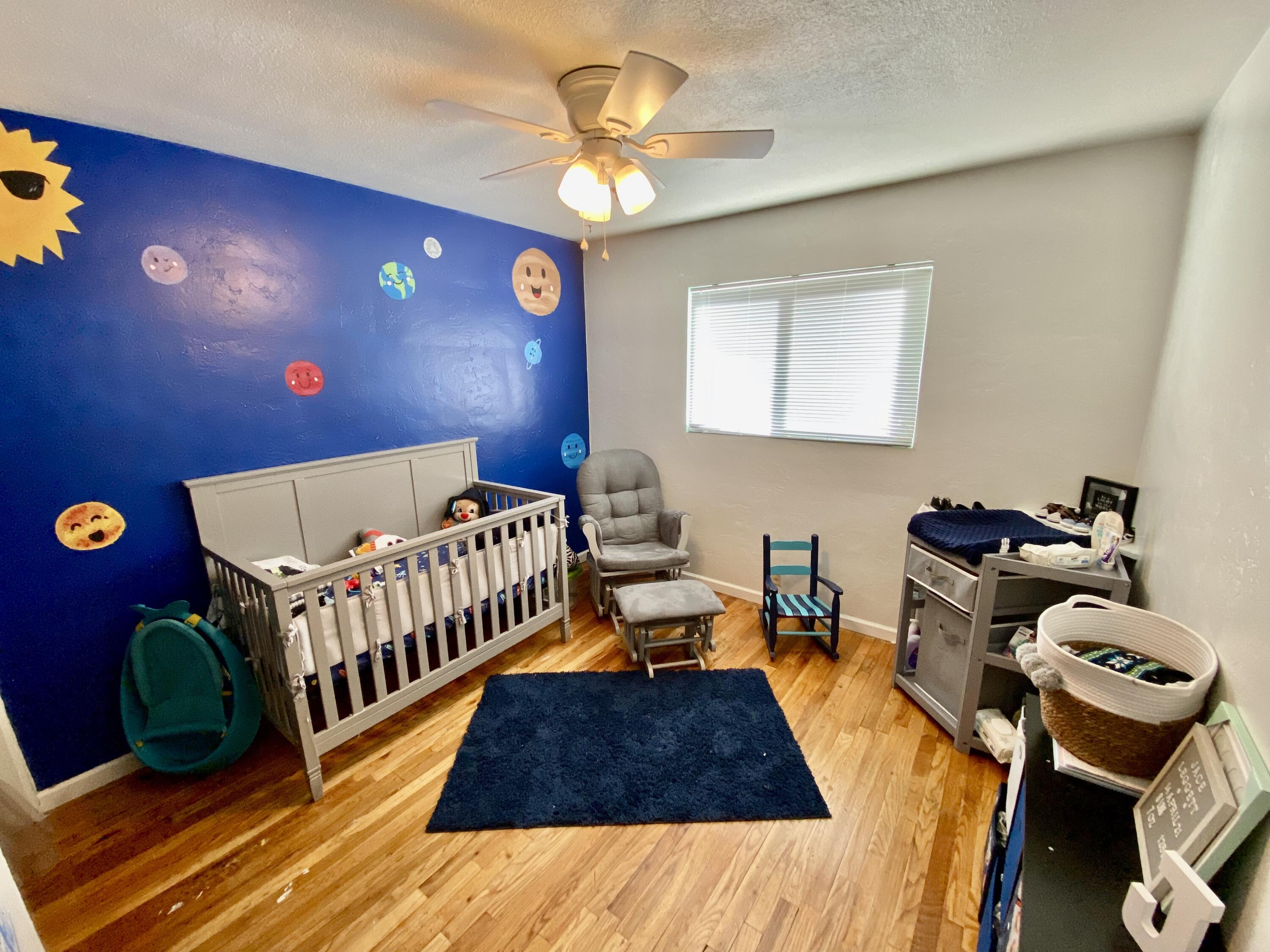 2890 Irwin Road Redding, CA 96002 - Photo 15 of 28 a bedroom with furniture and a window