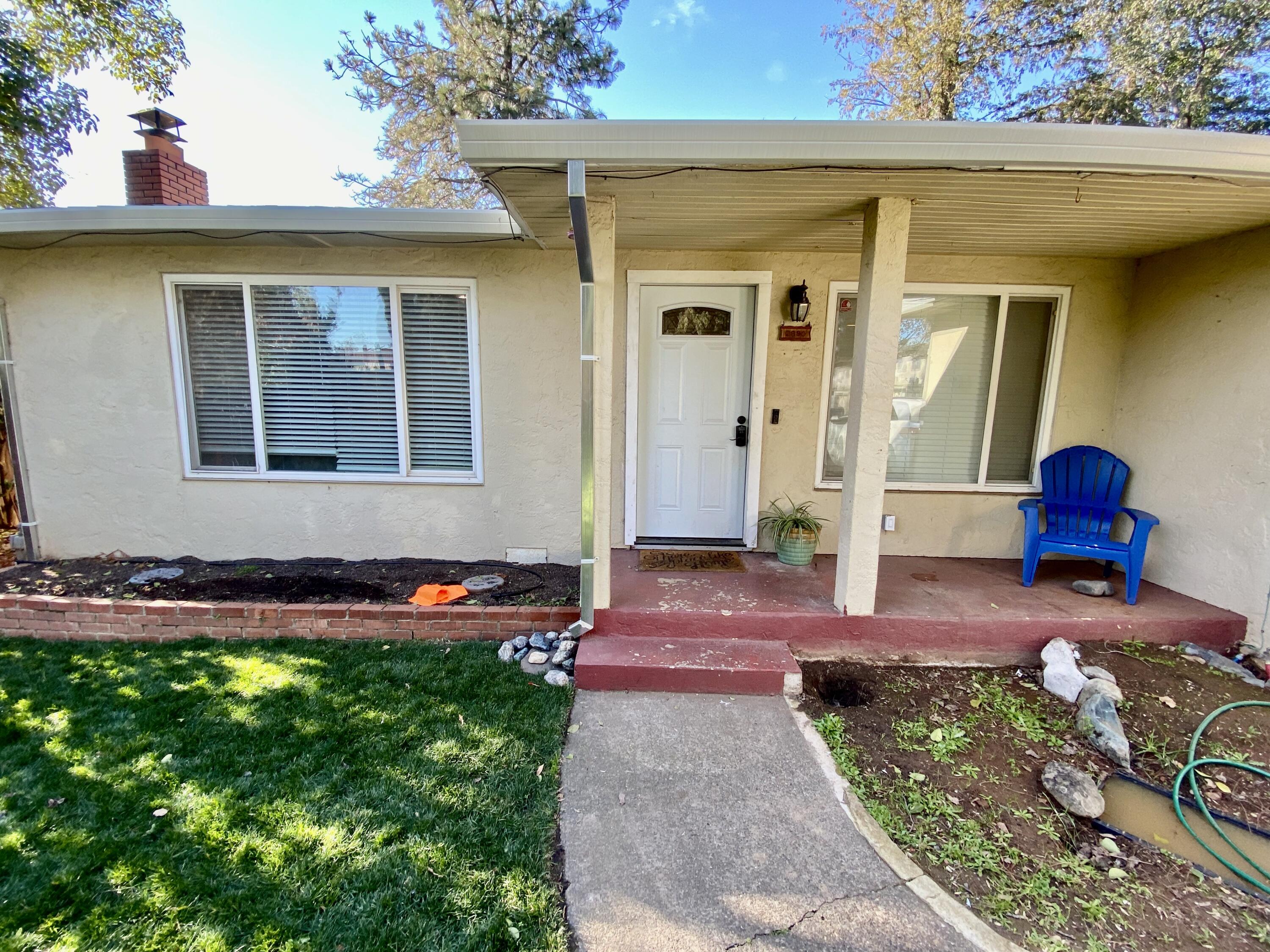 2890 Irwin Road Redding, CA 96002 - Photo 2 of 28 a front view of a house with garden