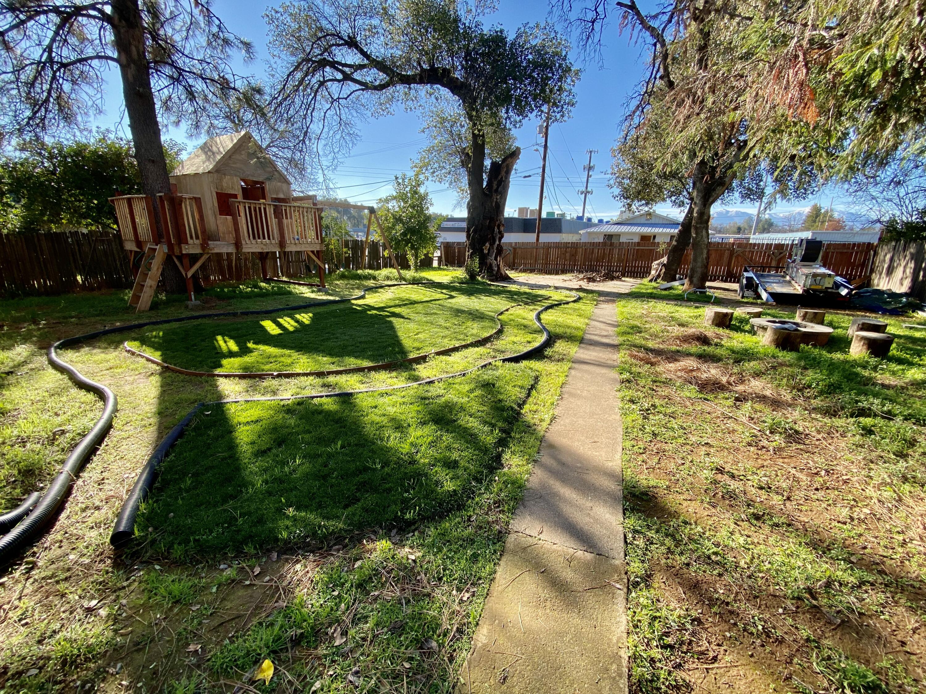2890 Irwin Road Redding, CA 96002 - Photo 22 of 28 a view of yard with swimming pool and green space