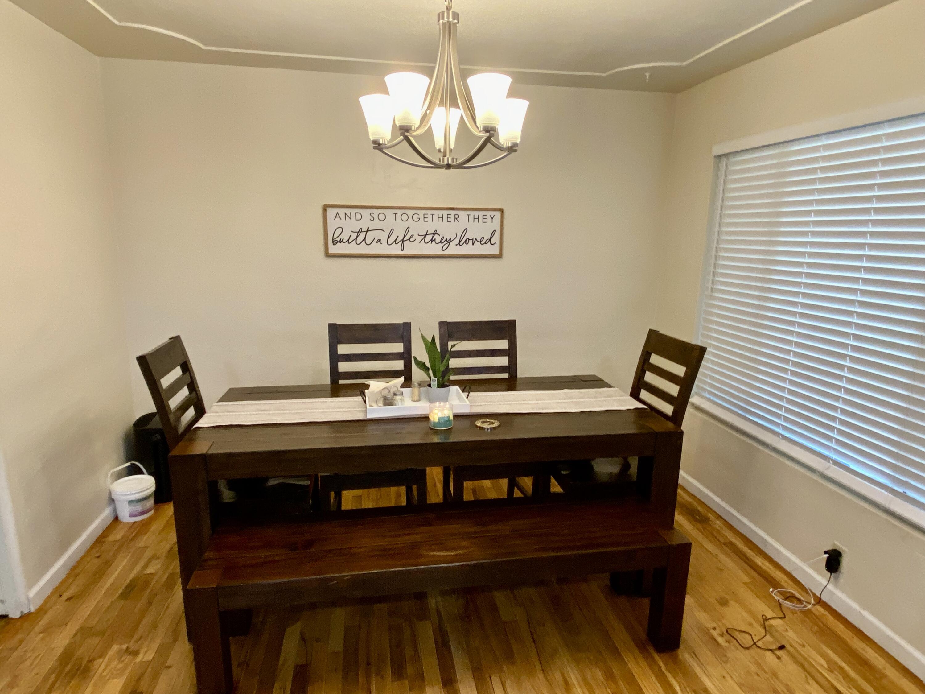 2890 Irwin Road Redding, CA 96002 - Photo 7 of 28 a view of a workspace with furniture and wooden floor