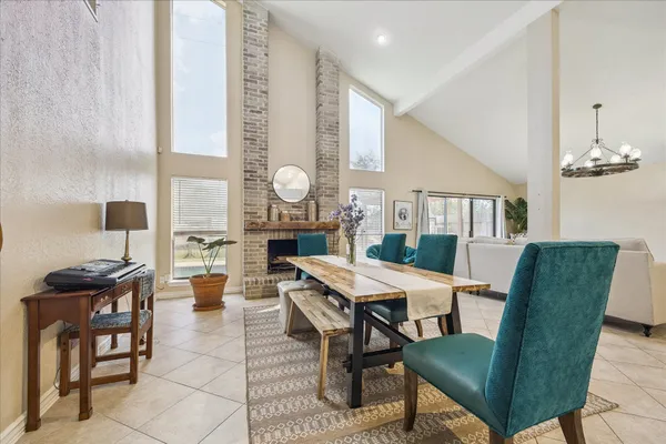 a view of a livingroom with furniture and window
