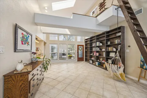 a view of an entryway with a lot of stuff