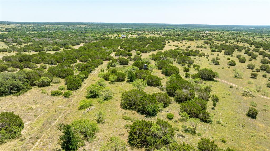 382 County Road 382 Carlton, TX 76436 - Photo 21 of 40 an aerial view of residential houses with outdoor space and trees