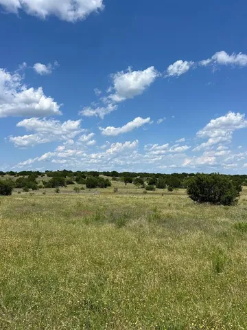 a view of an ocean beach and mountain view