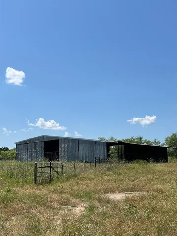 a fire hydrant in the middle of a field