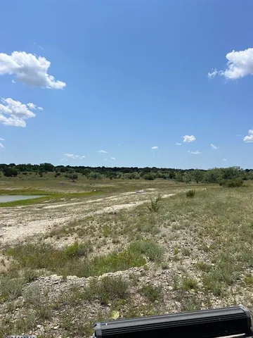 a view of an ocean and mountain