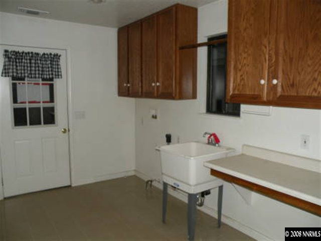 830 Foothill Road Gardnerville, NV 89460 - Photo 2 of 7 a room with furniture and cabinets