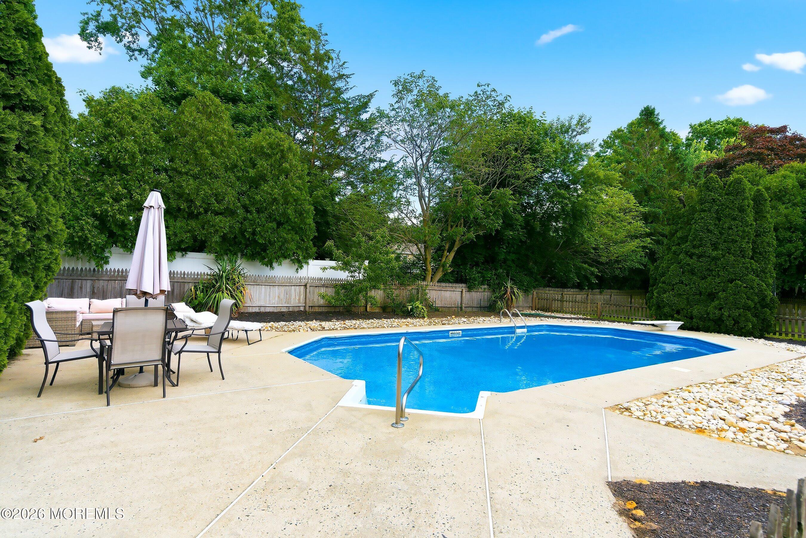 822 York Road Brick, NJ 08724 - Photo 27 of 37 a view of a swimming pool with chairs