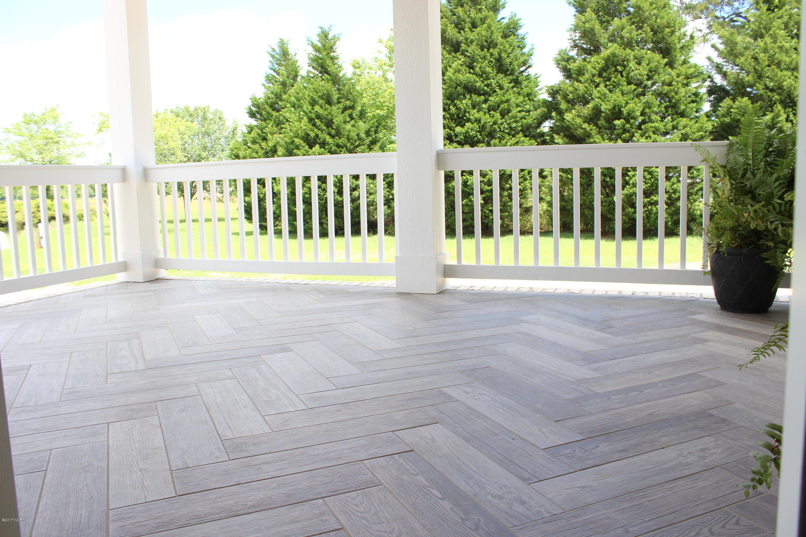 3747 Mobleys Bridge Road Grimesland, NC 27837 - Photo 58 of 86 porch floor tile