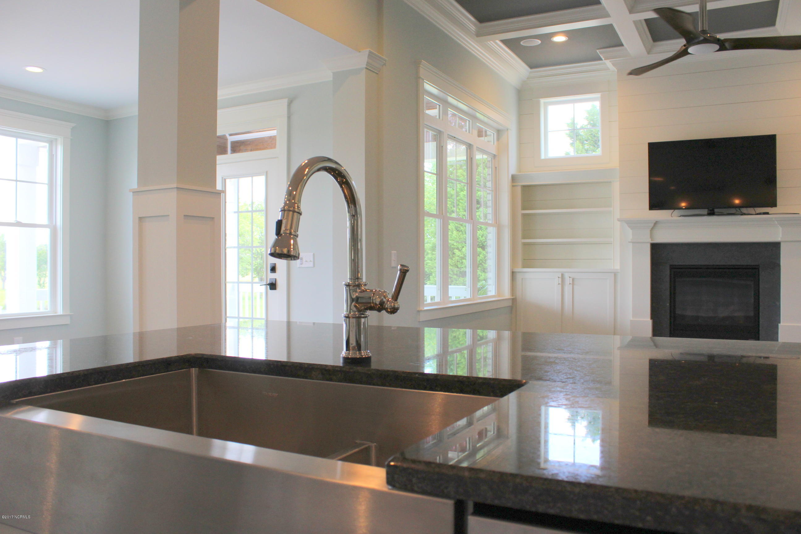 3747 Mobleys Bridge Road Grimesland, NC 27837 - Photo 10 of 86 behind sink to LR