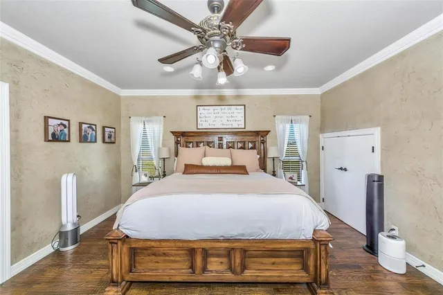 a bedroom with a bed and a table