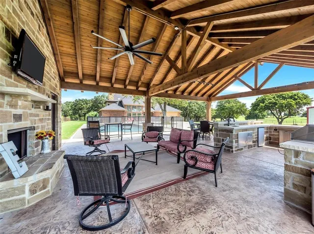 a view of a swimming pool with a patio