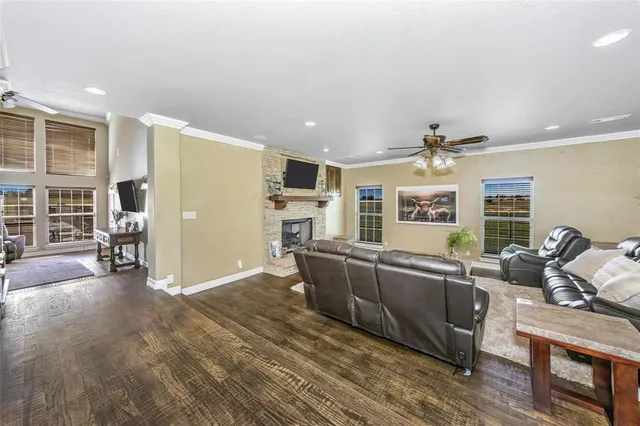 a living room with furniture and a table