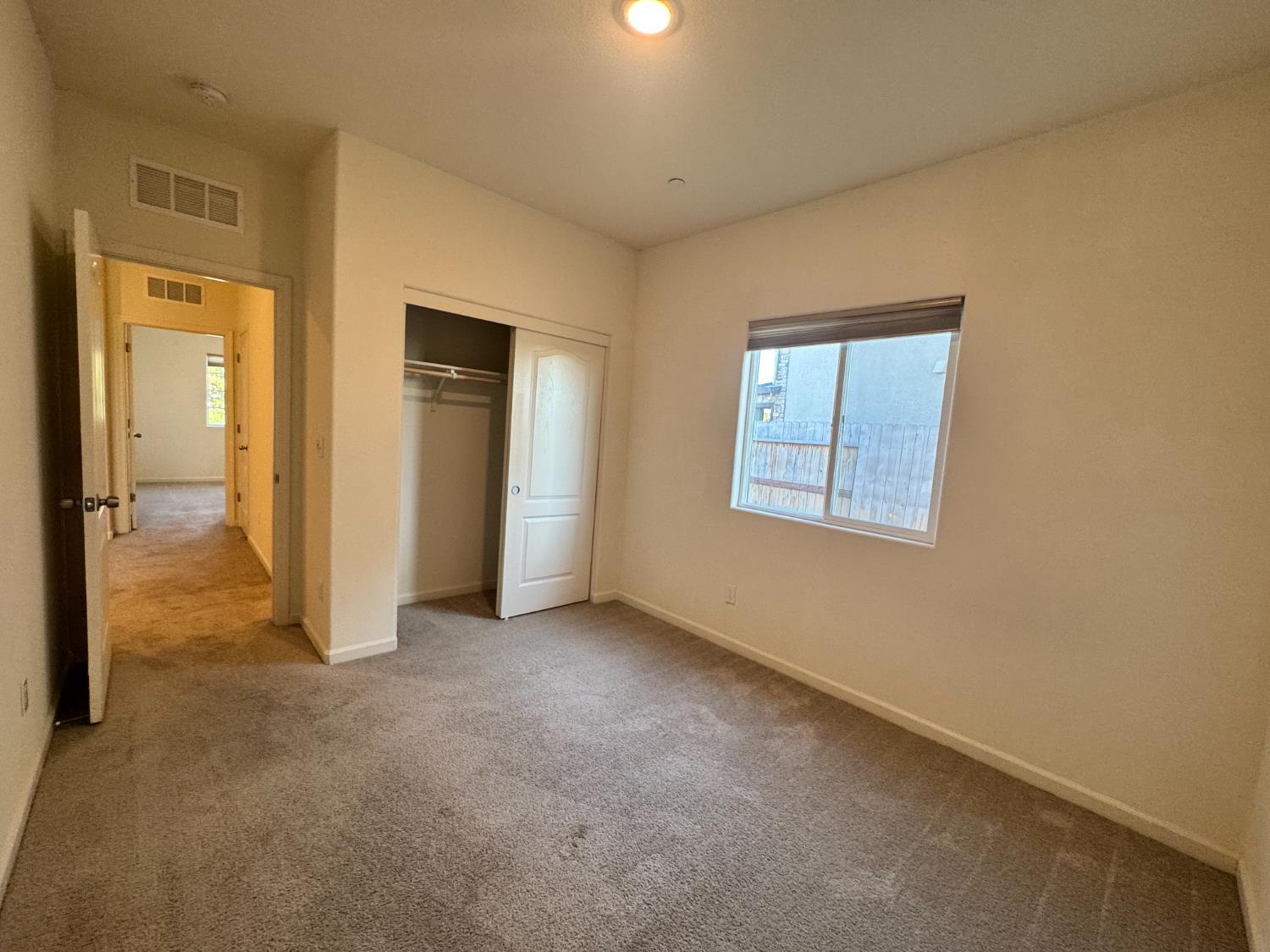 4271 Freemark Avenue Merced, CA 95348 - Photo 20 of 37 an empty room with windows