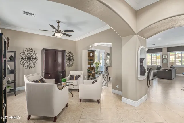 a lobby with furniture and wooden floor