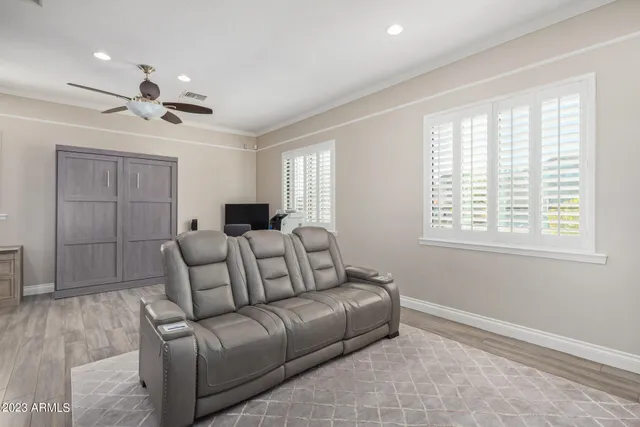 a view of a swimming pool with a patio