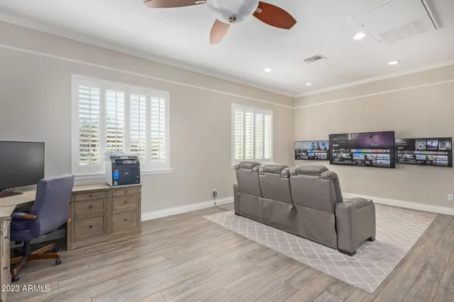 a view of a garden with a building in the background