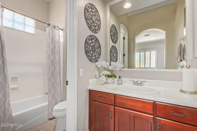 a view of a house with furniture and a potted plant