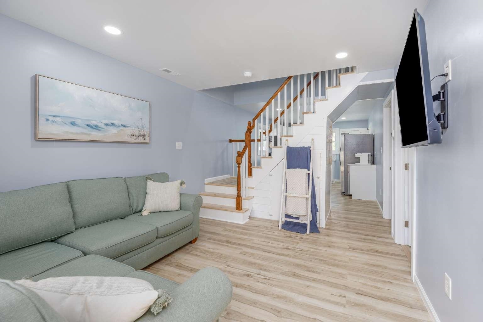 5 Kenvil Road North Cape May, NJ 08204 - Photo 4 of 19 a living room with furniture and a flat screen tv