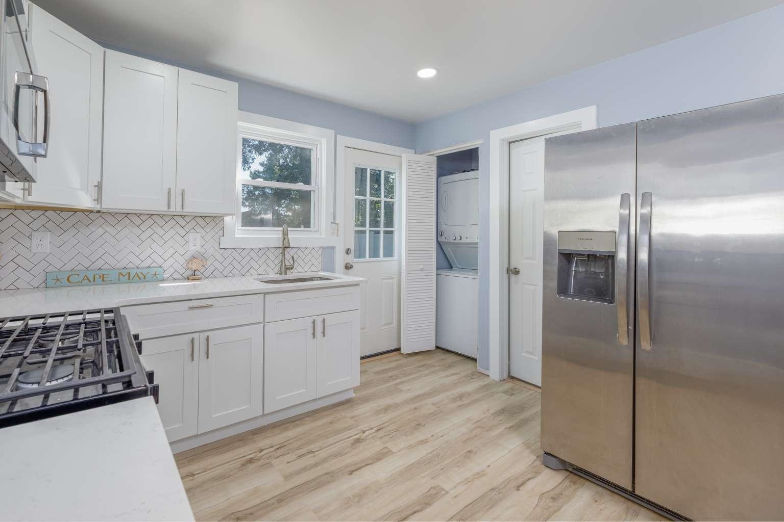 5 Kenvil Road North Cape May, NJ 08204 - Photo 8 of 19 a kitchen with a refrigerator sink and cabinets