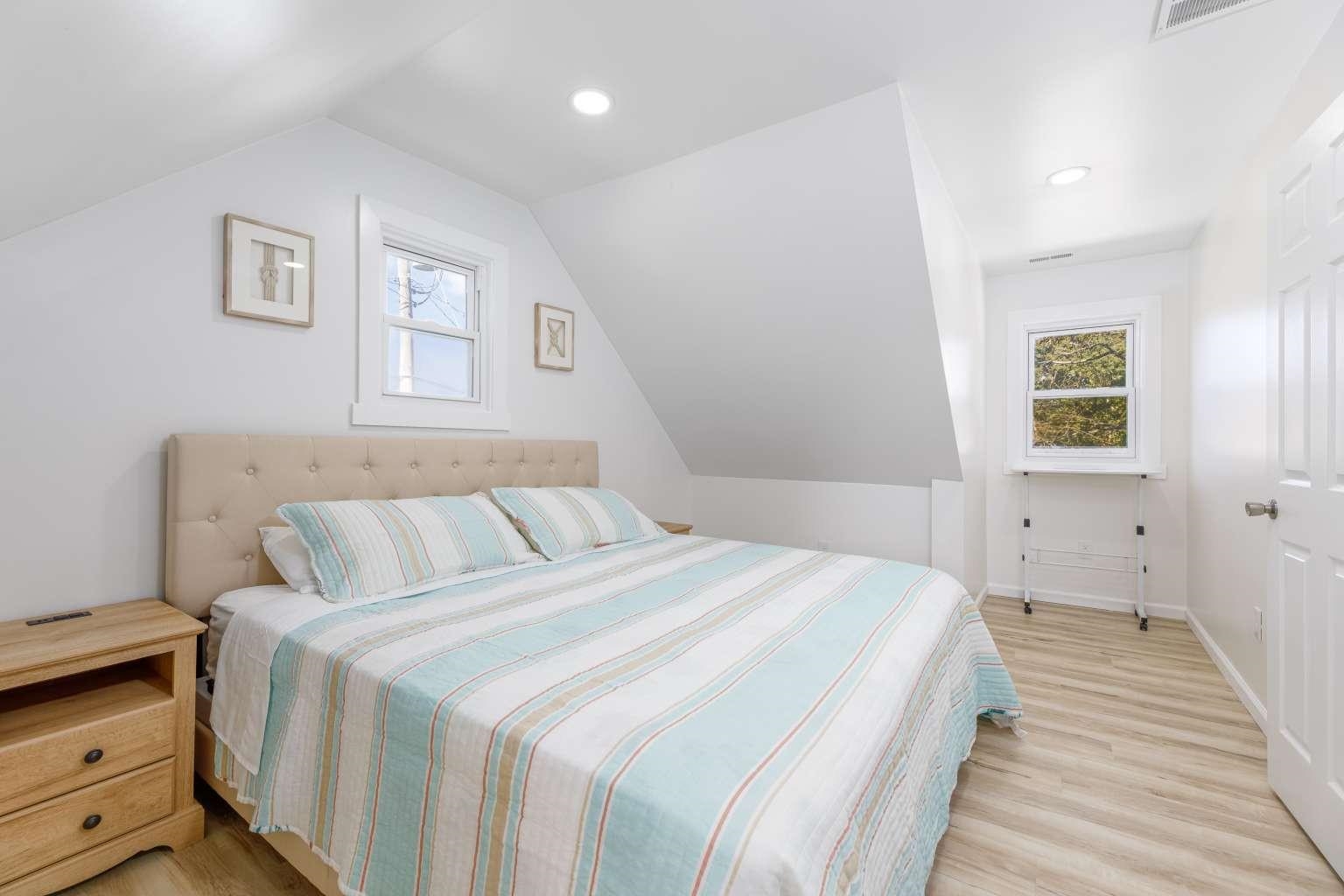 5 Kenvil Road North Cape May, NJ 08204 - Photo 9 of 19 a bedroom with a bed and a window