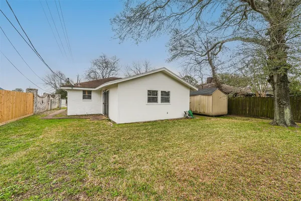 a bathroom with a sink and a yard