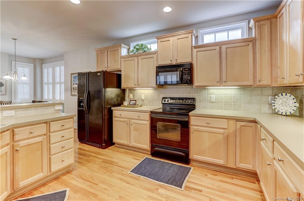3288 Richard's Crossing Fort Mill, SC 29708 - Photo 11 of 36 a kitchen with stainless steel appliances a refrigerator stove and sink
