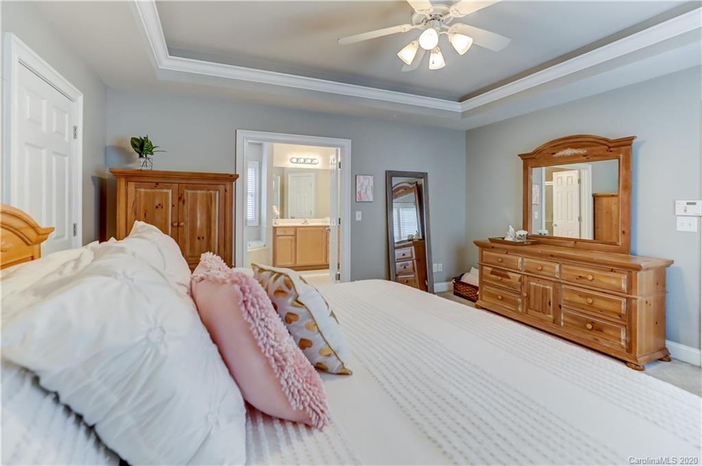 3288 Richard's Crossing Fort Mill, SC 29708 - Photo 19 of 36 a bedroom with a bed and wooden floor