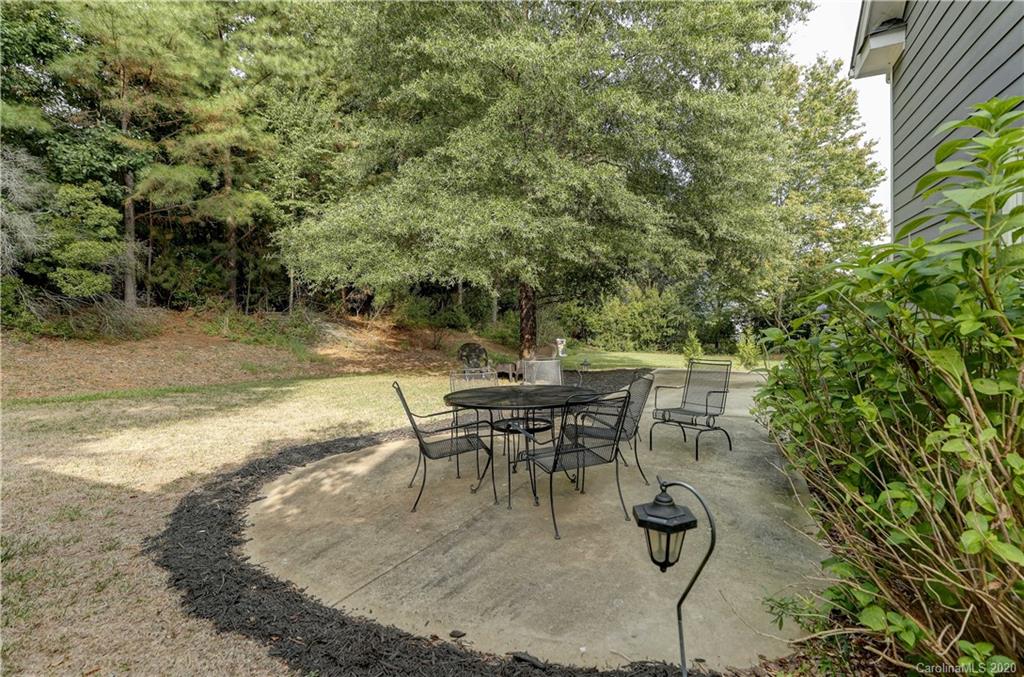 3288 Richard's Crossing Fort Mill, SC 29708 - Photo 31 of 36 a view of a backyard with table and chairs