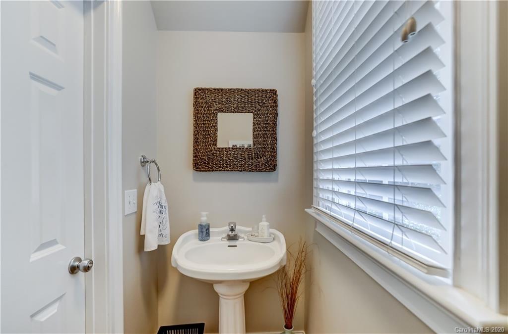 3288 Richard's Crossing Fort Mill, SC 29708 - Photo 9 of 36 a bathroom with a sink and a mirror