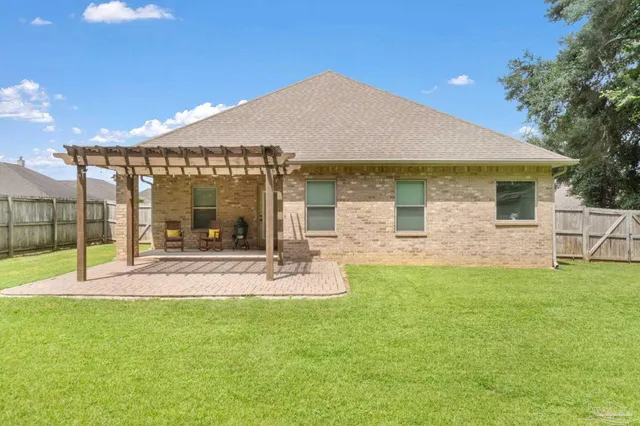 a house view with a garden space