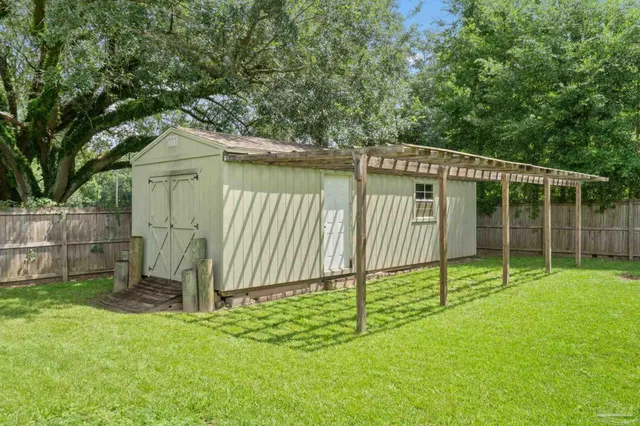 an aerial view of a house with a garden