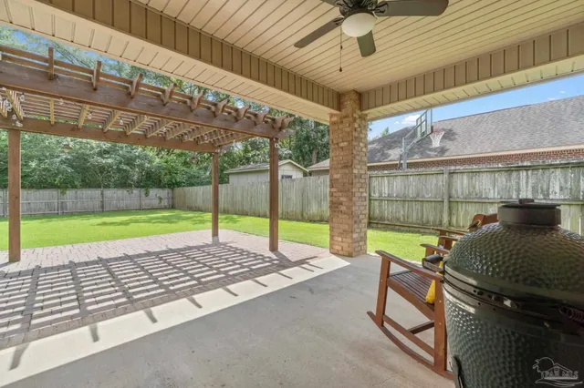 a view of a backyard with a tv