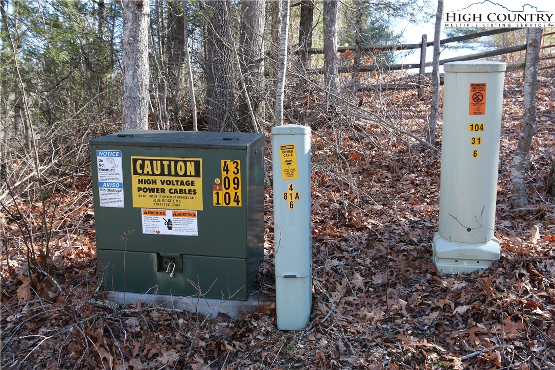 Lot 9 Clearview Ridge Road Crumpler, NC 28617 - Photo 6 of 21 a view of a brick house with a tree