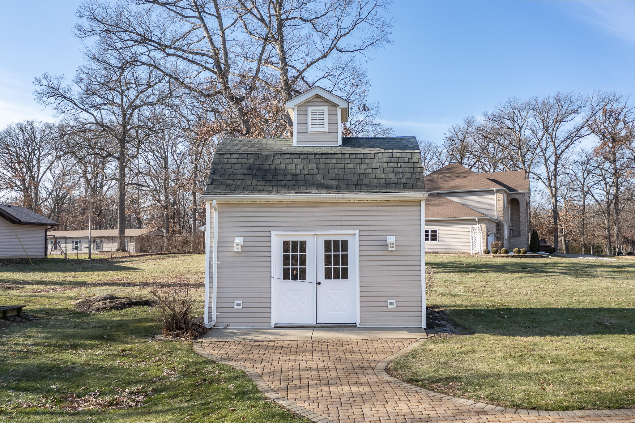 8049 West 85th Court Crown Point, IN 46307 - Photo 14 of 50 a front view of a house with a yard