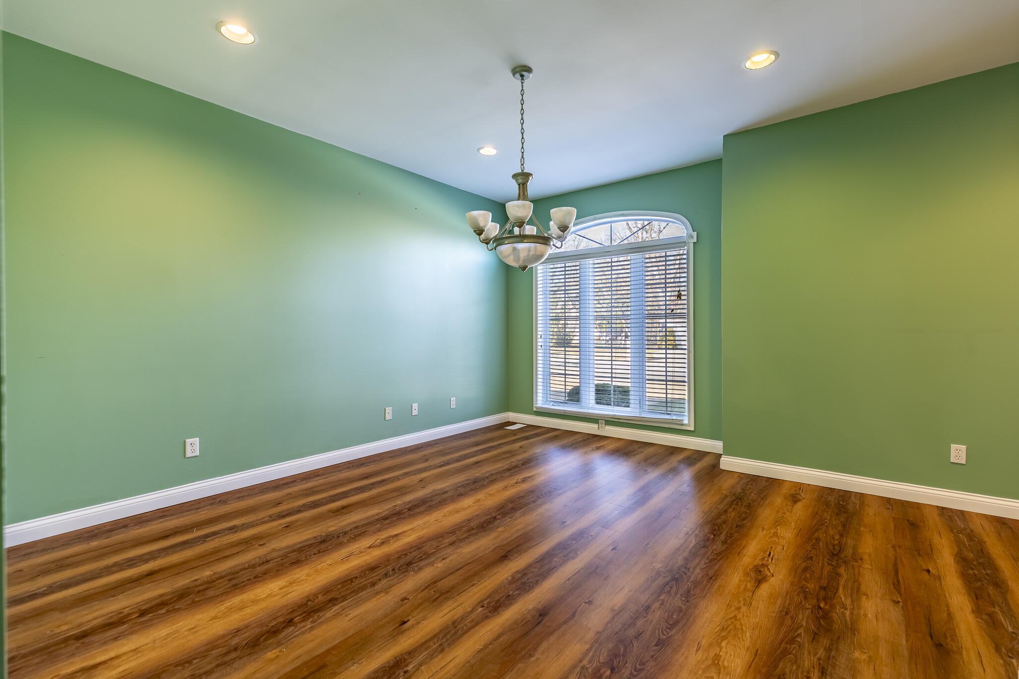 8049 West 85th Court Crown Point, IN 46307 - Photo 18 of 47 a view of a room with window and wooden floor