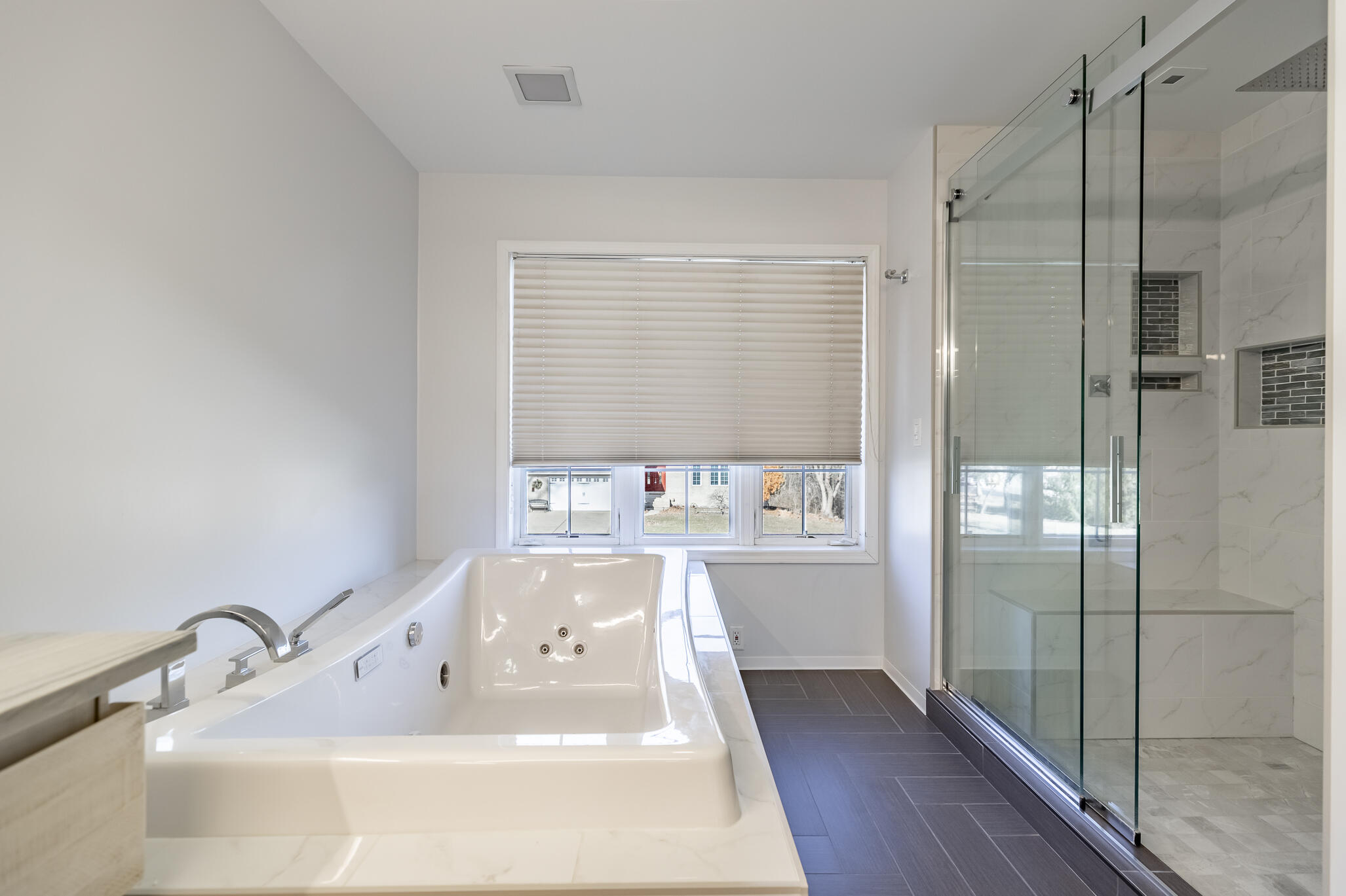 8049 West 85th Court Crown Point, IN 46307 - Photo 30 of 47 a bathroom with a bathtub and a sink