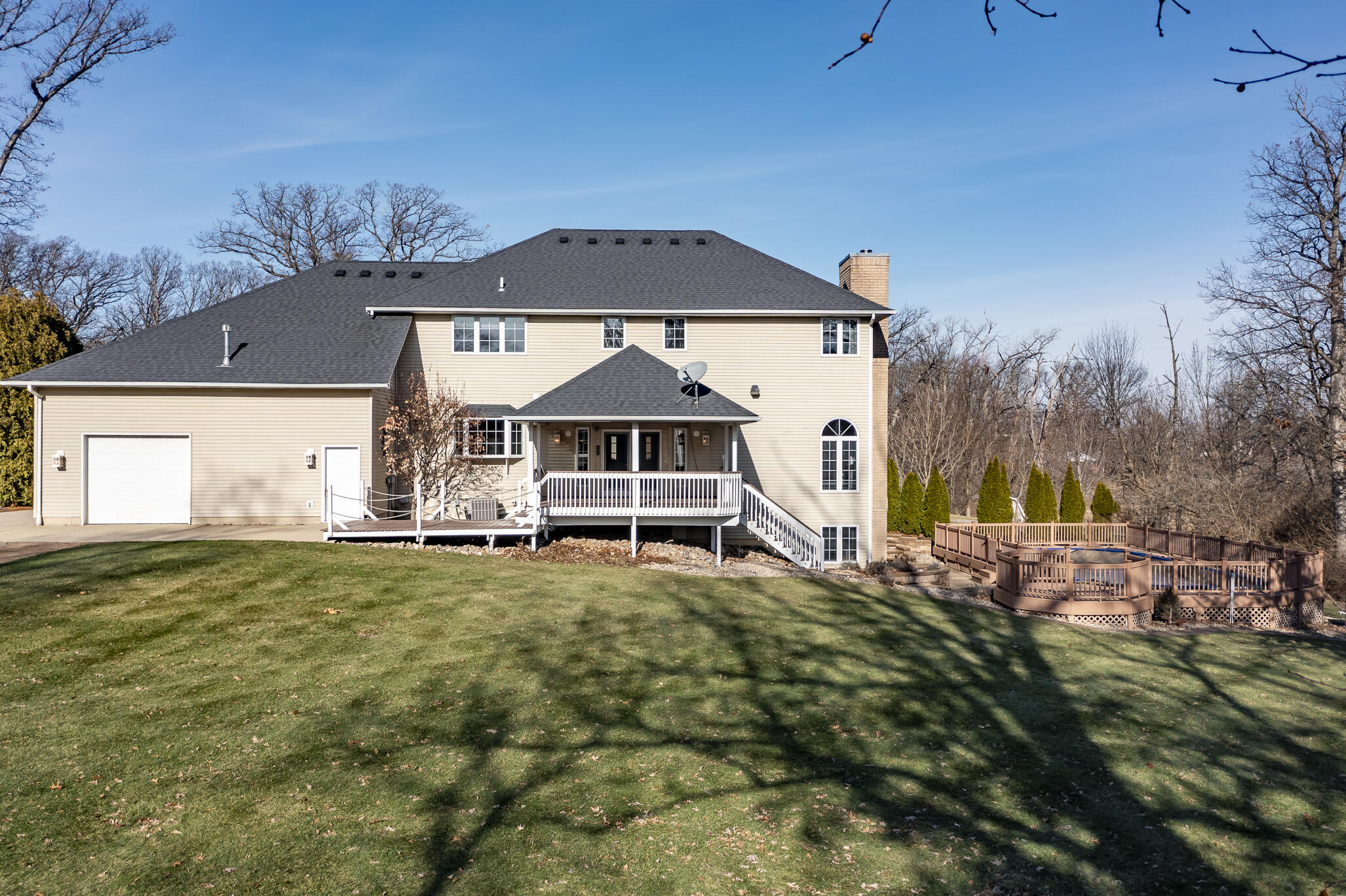 8049 West 85th Court Crown Point, IN 46307 - Photo 3 of 47 a house with green field in front of it