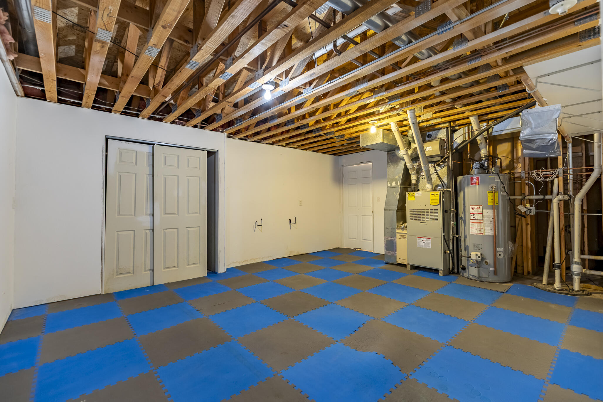 8049 West 85th Court Crown Point, IN 46307 - Photo 40 of 47 a bedroom with a bed and a view of empty room
