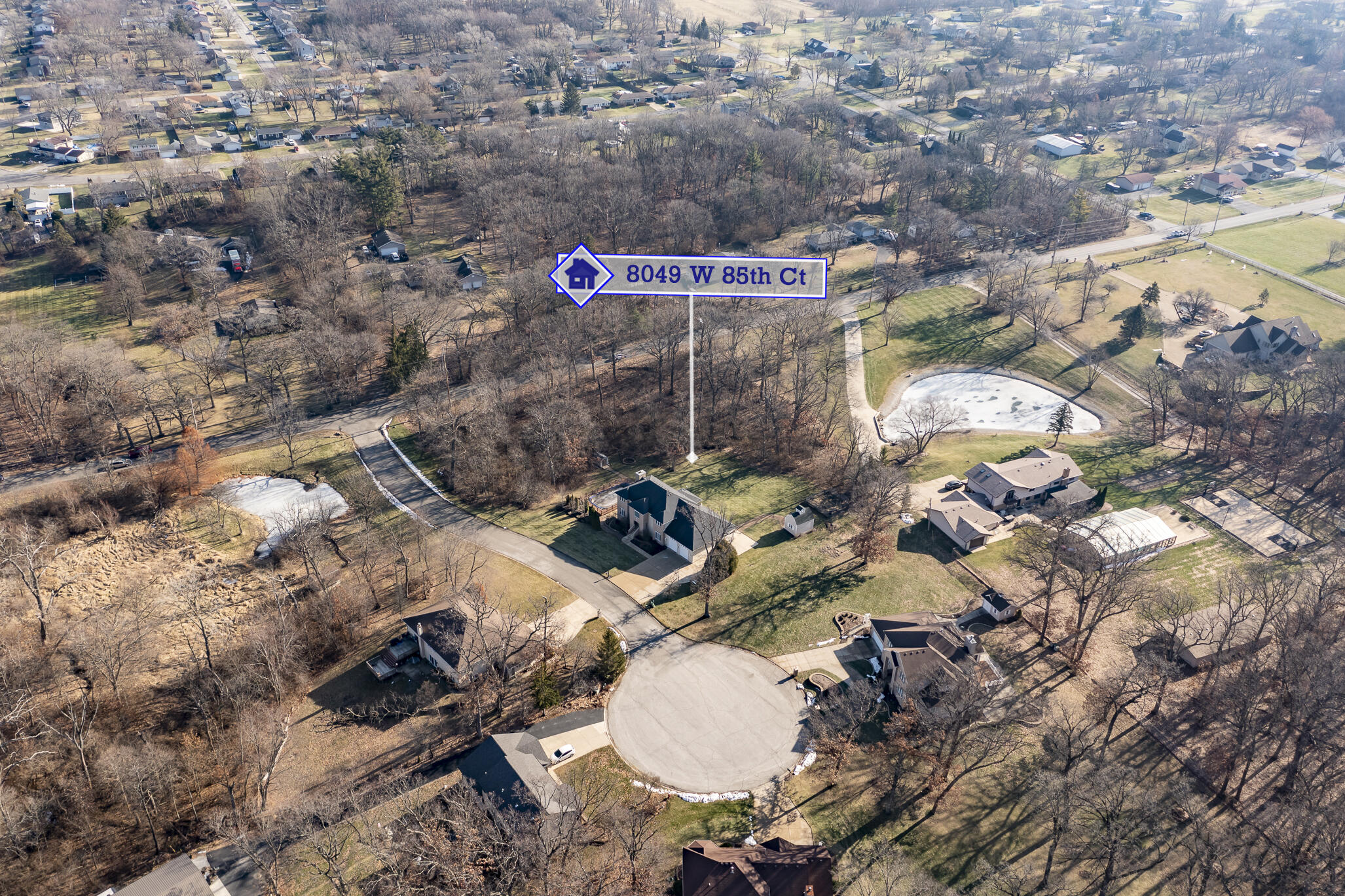 8049 West 85th Court Crown Point, IN 46307 - Photo 46 of 50 an aerial view of residential houses with outdoor space