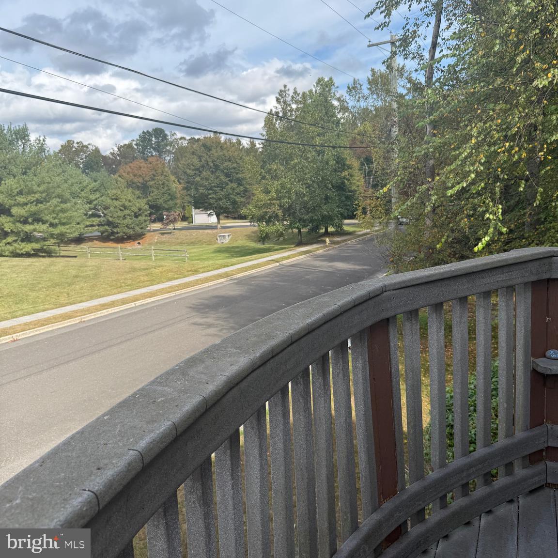 403 Roosevelt Avenue Clementon, NJ 08021 - Photo 13 of 26 a view of balcony with wooden floor and fence
