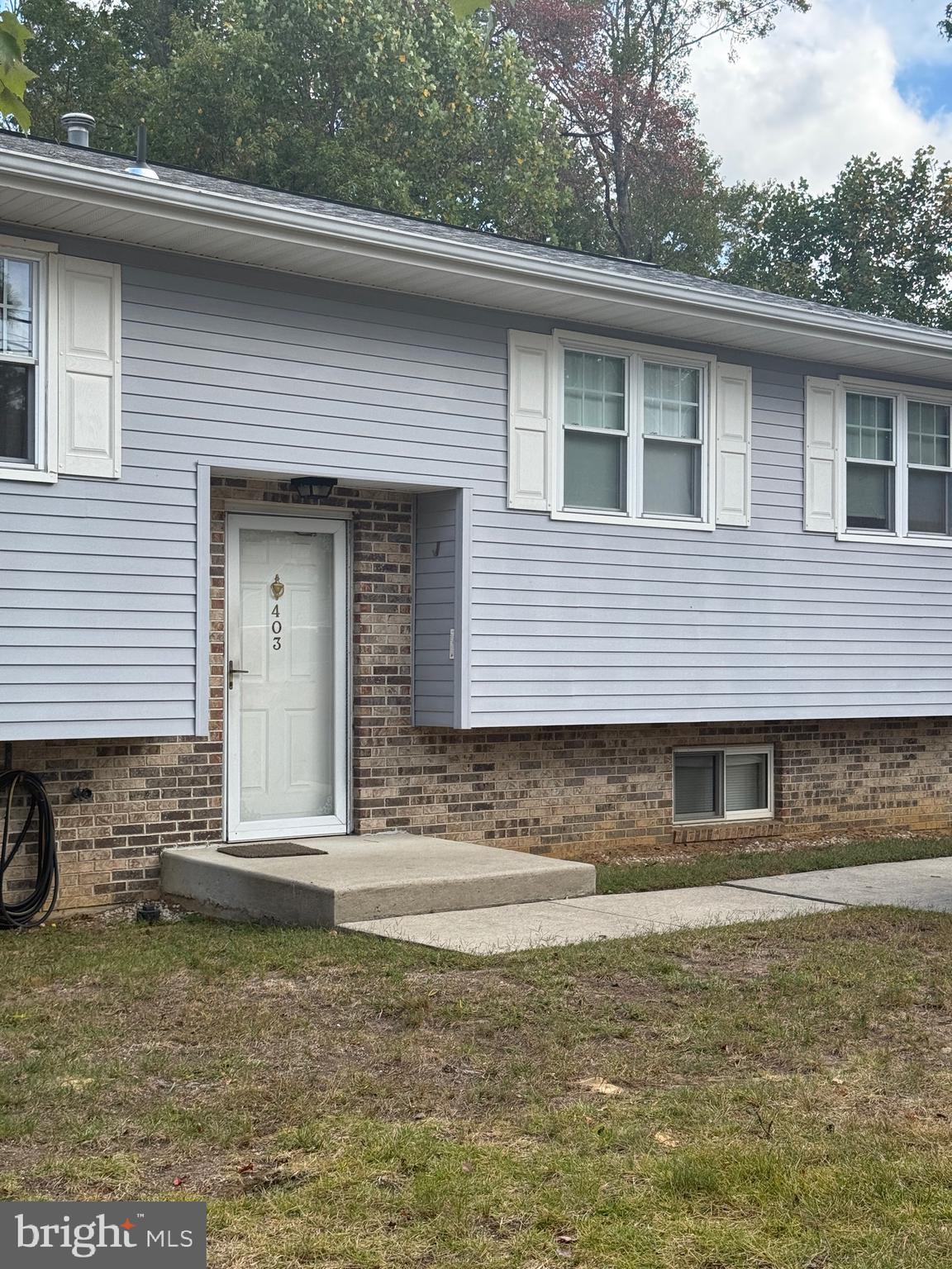 403 Roosevelt Avenue Clementon, NJ 08021 - Photo 19 of 26 a front view of a house with a yard