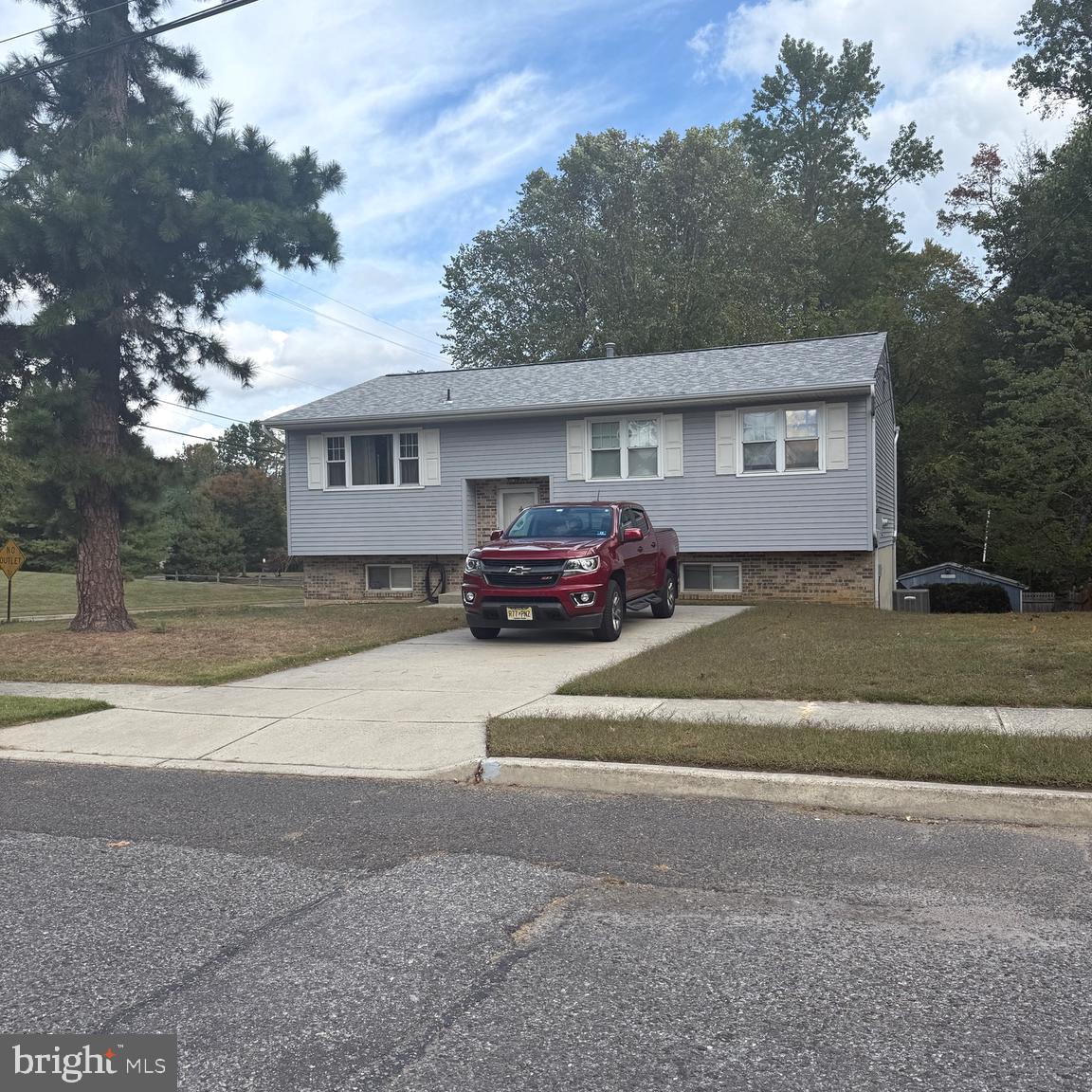 403 Roosevelt Avenue Clementon, NJ 08021 - Photo 25 of 26 a front view of a house with a yard