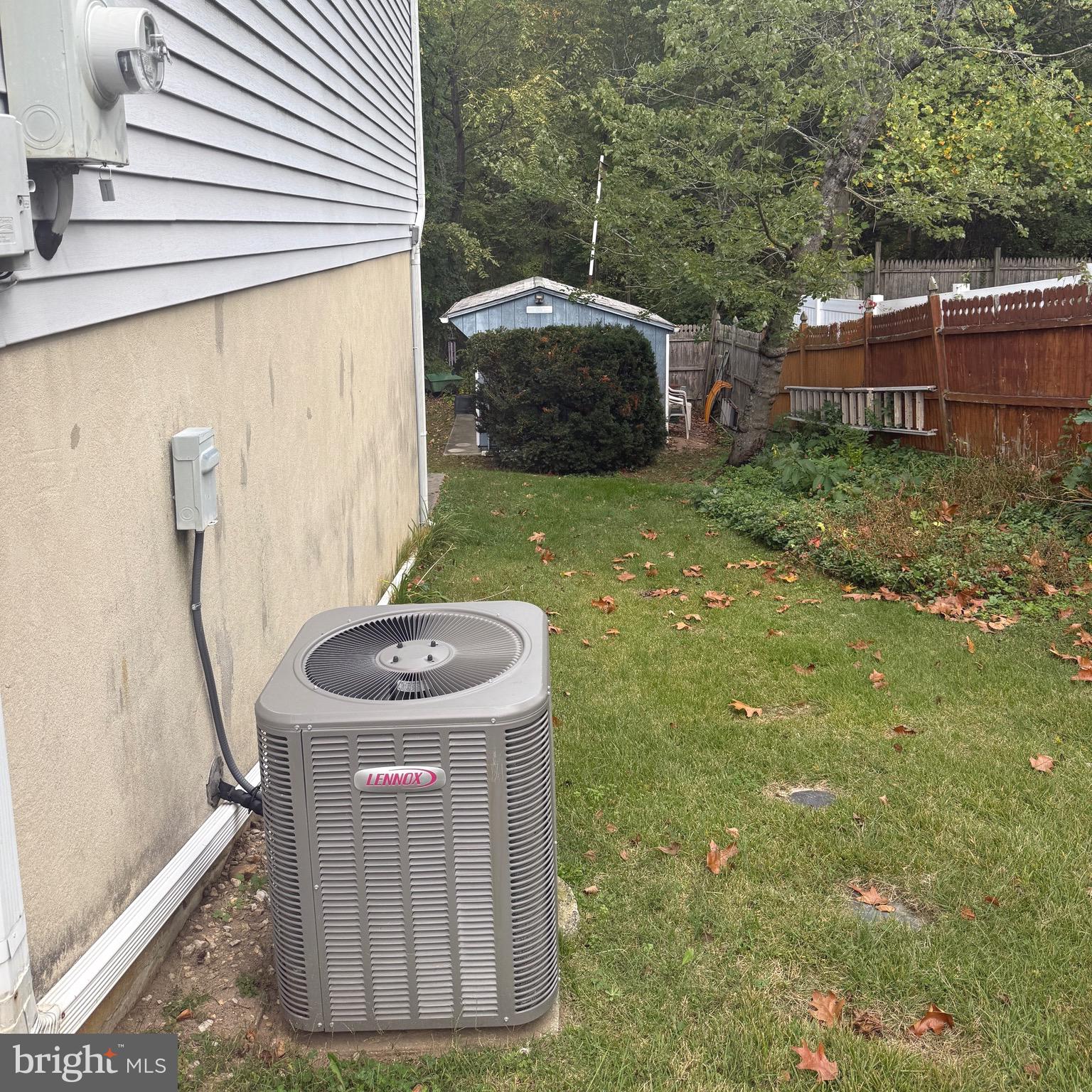 403 Roosevelt Avenue Clementon, NJ 08021 - Photo 3 of 26 a backyard of a house with barbeque oven