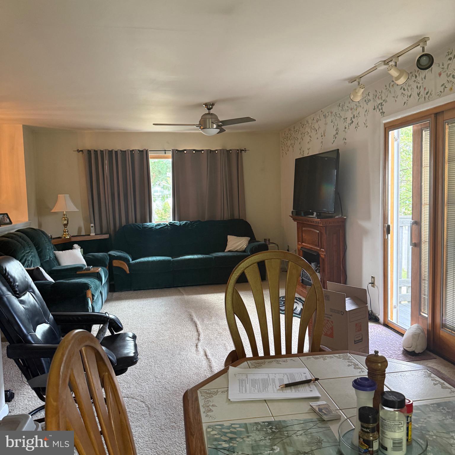 403 Roosevelt Avenue Clementon, NJ 08021 - Photo 5 of 26 a living room with furniture and a flat screen tv