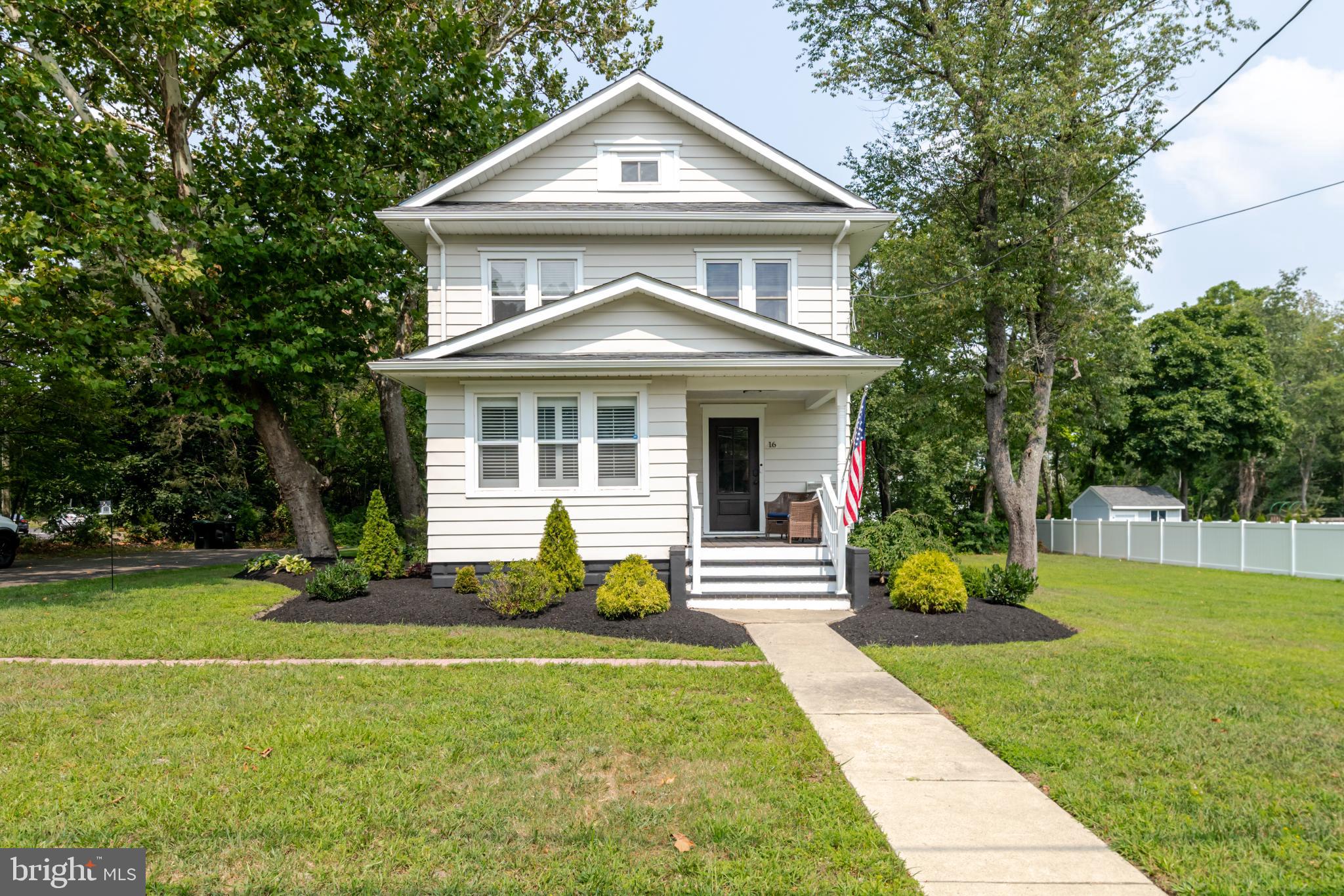 16 Townsend Avenue Berlin, NJ 08009 - Photo 2 of 50 a view of a house with a yard and plants