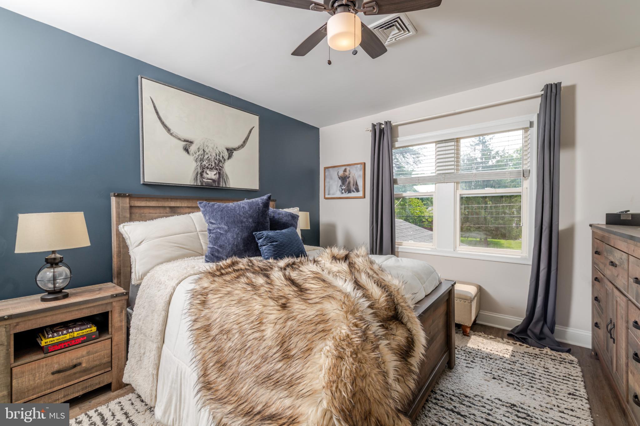 16 Townsend Avenue Berlin, NJ 08009 - Photo 22 of 50 a bed sitting in a bedroom next to a window