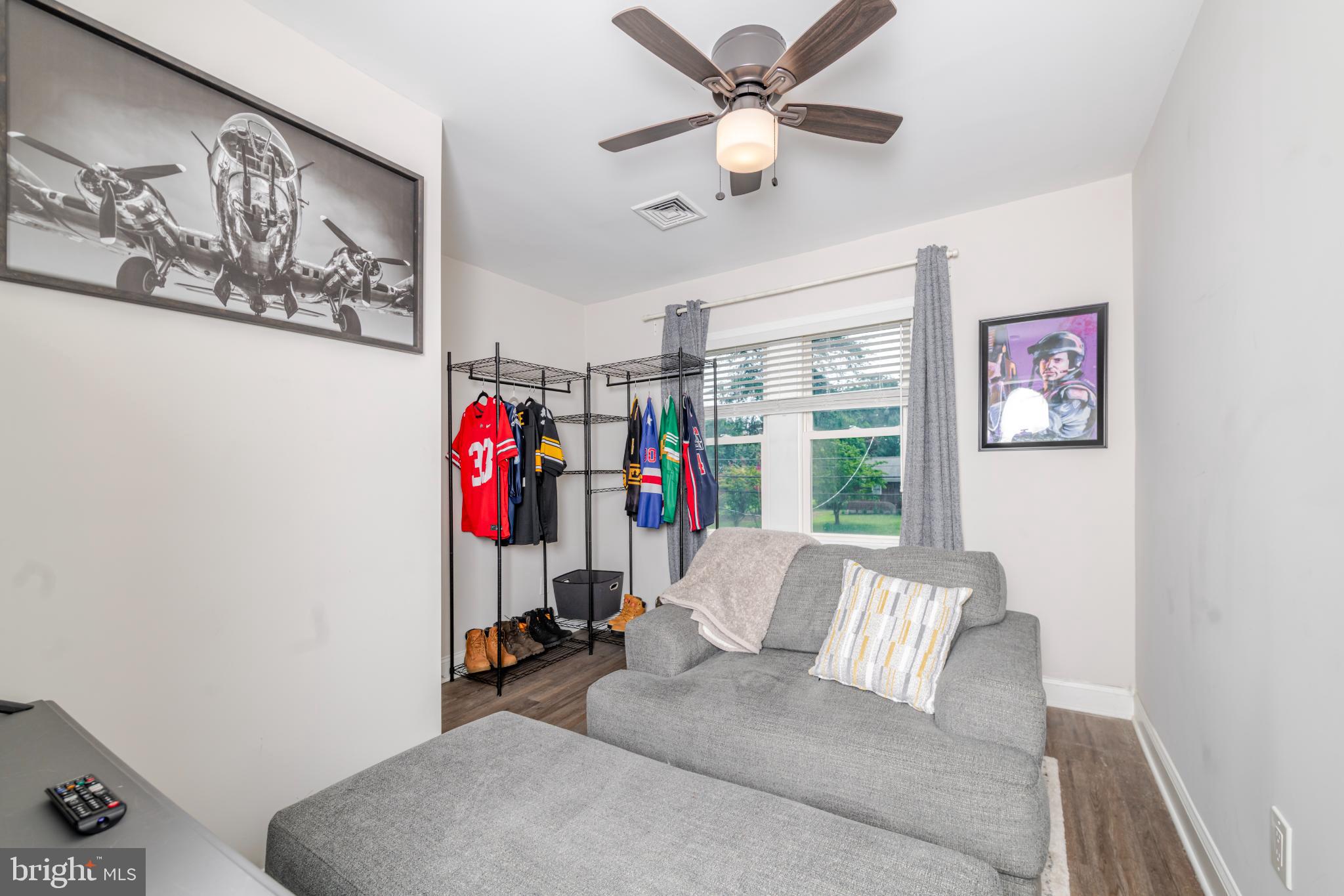 16 Townsend Avenue Berlin, NJ 08009 - Photo 25 of 50 a view of a livingroom with furniture and a fan