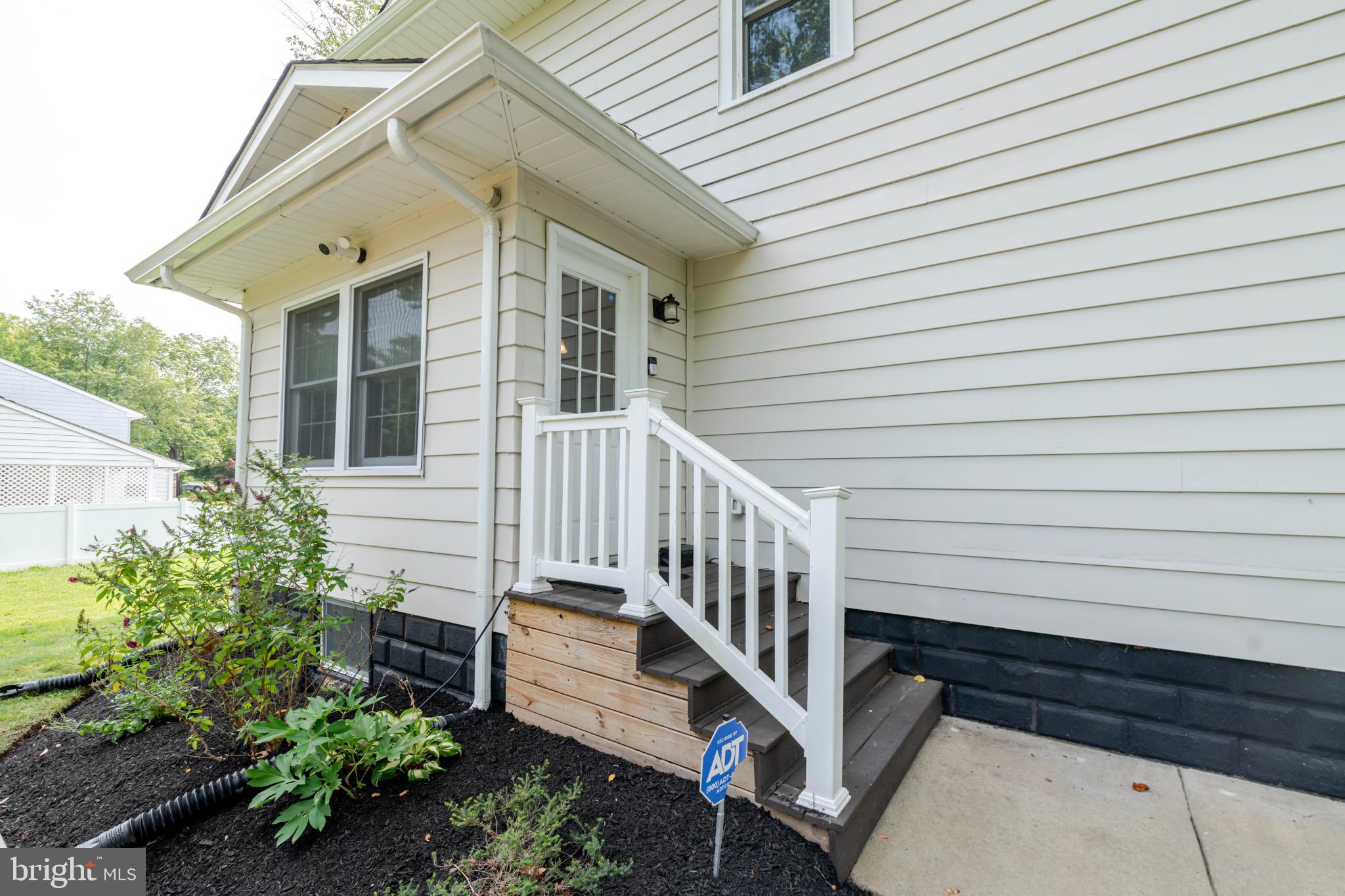16 Townsend Avenue Berlin, NJ 08009 - Photo 33 of 50 a view of a white house with wooden fence